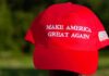 MAGA Hat Receipts Inside Federal Files Red baseball cap with political slogan and small U.S. flag patch