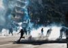 Water Cannons Over Wages – France Boils Protesters running through tear gas on a city street