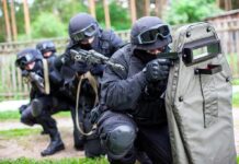 SWAT Enters House – Finds Unthinkable Tactical team advancing with ballistic shield and rifles