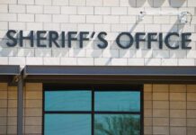 Candidate’s Brutal Attack Rocks Sun City sheriff's office building exterior sign