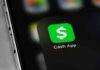 Cash App Breach – Who Really Gets Paid? Cash App icon on smartphone screen