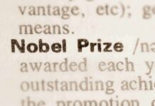 Who Gets Medicine’s Crown Today? Nobel Prize text highlighted in a dictionary
