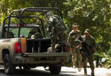 Cobalt Ambush Rocks Congo – Americans Hit soldiers in camouflage near a military pickup truck
