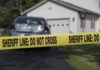 Bloody Scene, One Line – Case Explodes Sheriff line tape blocking a suburban driveway