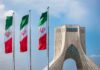 Iranian flags beside Azadi Tower in Tehran