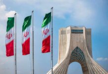 How One Decision Reshaped A Nation’s Leadership Iranian flags beside Azadi Tower in Tehran