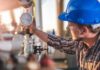 Semiconductor Lifeline Suddenly “Critical” Engineer in blue hard hat checking a pressure gauge