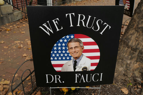 Sign reading We Trust Dr. Fauci on display.