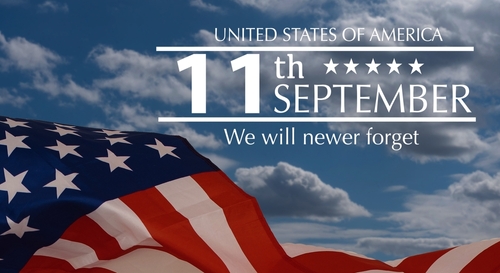 American flag with text commemorating September 11