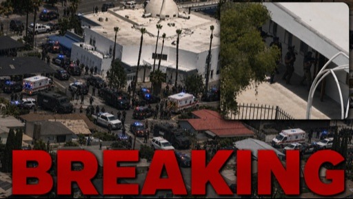 Aerial view of a large police presence at a scene marked as breaking news